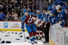 Dec 21, 2023; Denver, Colorado, USA; Colorado Avalanche center Nathan MacKinnon (29) celebrates his hat trick goal with the bench in the third period against the Ottawa Senators at Ball Arena./Isaiah J. Downing-USA TODAY Sports